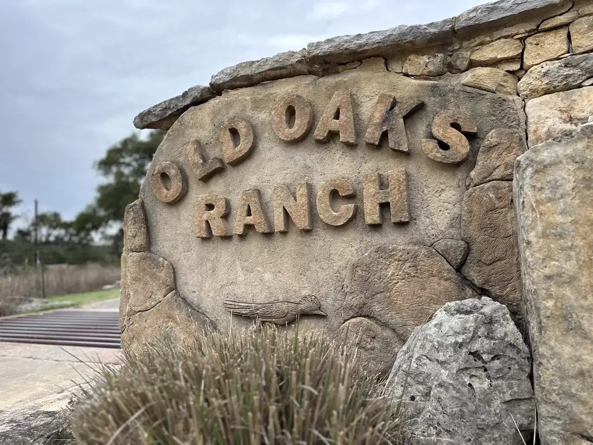“Old Oaks Ranch” stone sign identifying the Nova Recovery Center property in Wimberley, Texas.